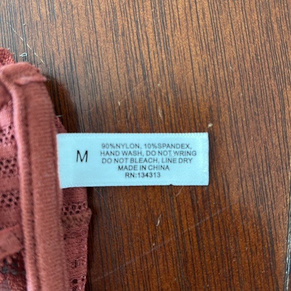 Burnt orange coloured bralette. Size Medium - Picture 3 of 3